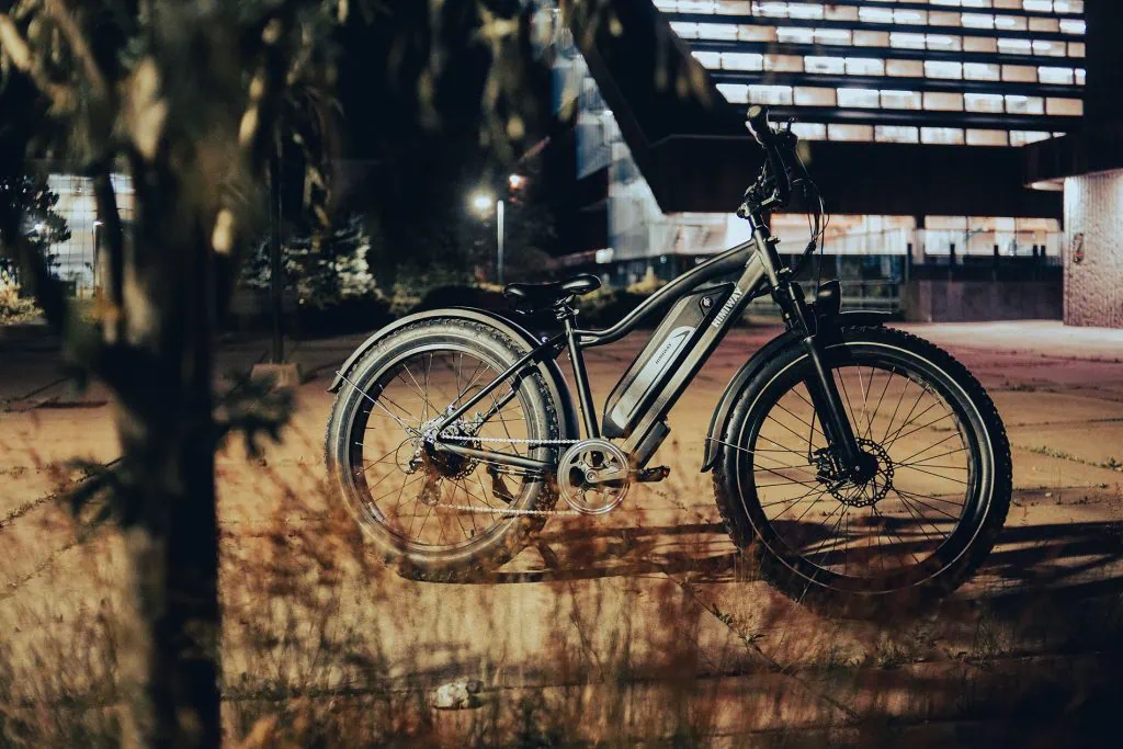High-performance Smittys E-Bike in urban night setting.