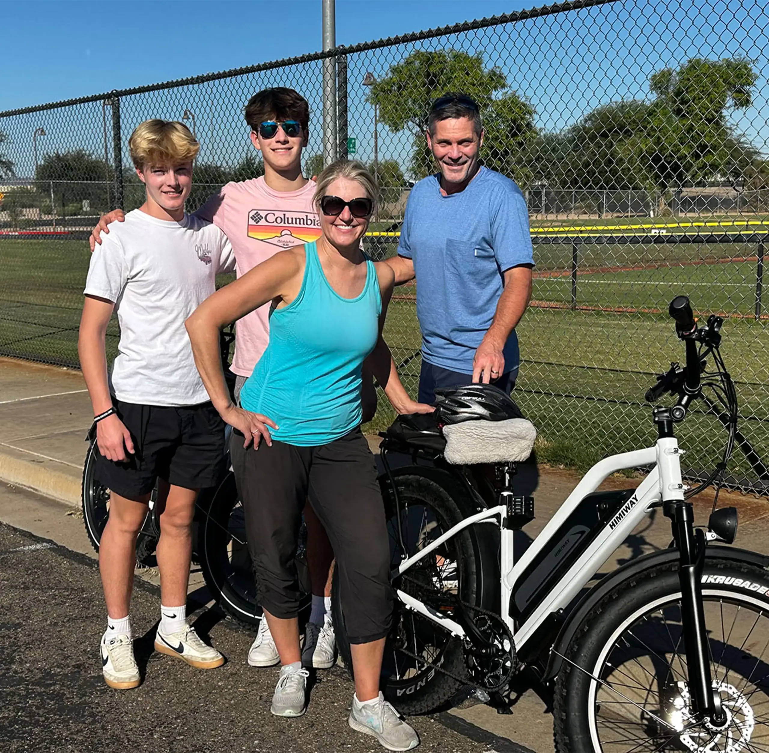 Family with Smitty's rental e-bikes at Rio Vista Park in Peoria